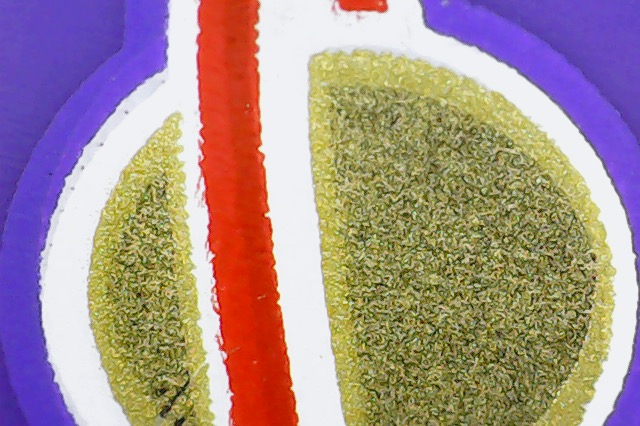 closeup of classic space logo on purple minifigure torso