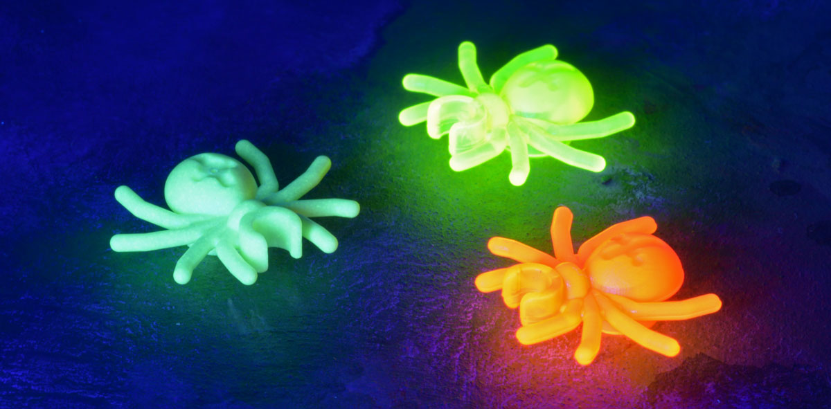 image of glowing spiders
