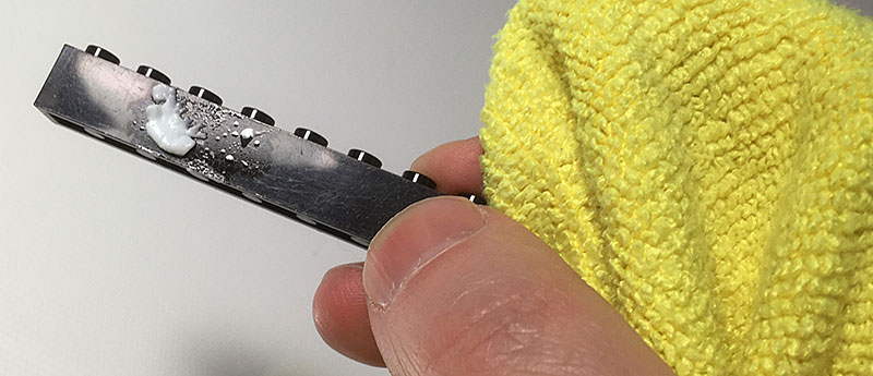 picture of brick with blob of polish